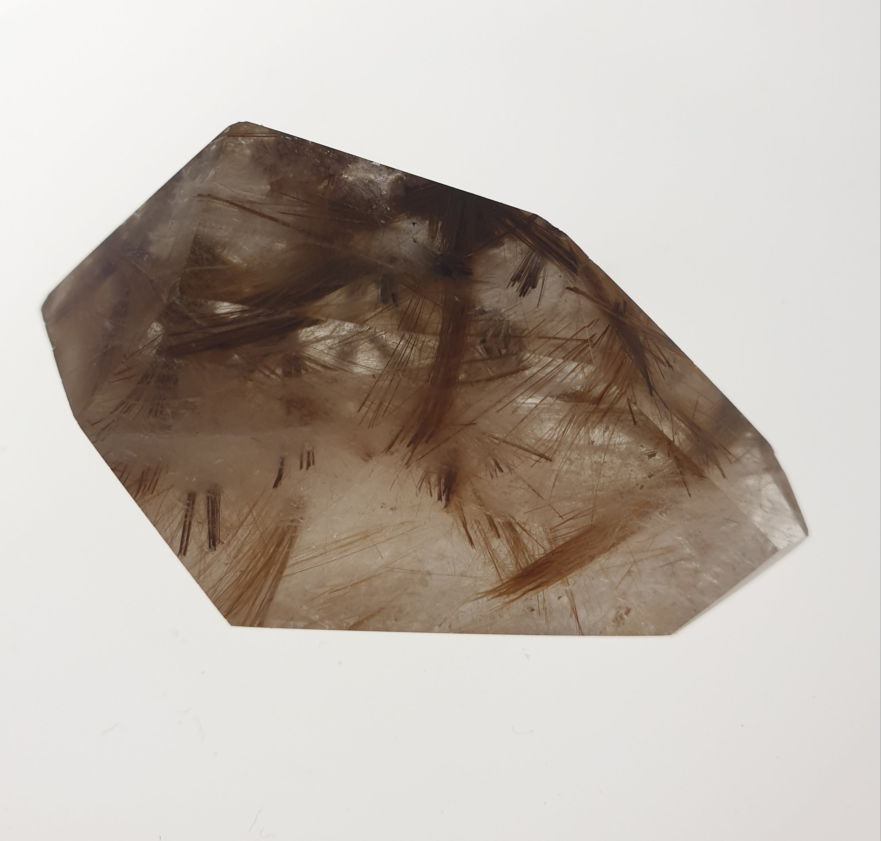 Rutilated Quartz, faceted freeform.