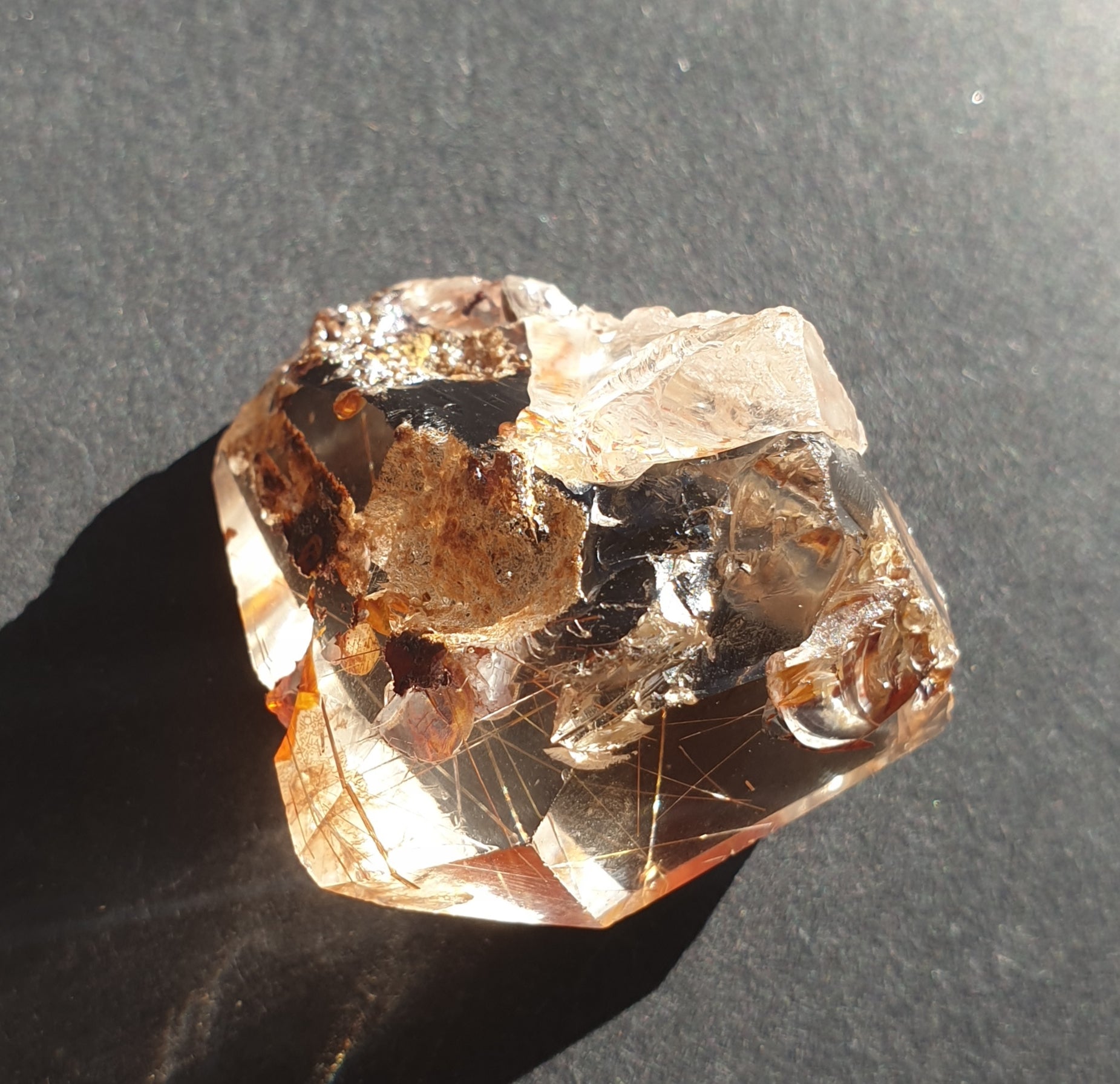 Amphibole Quartz facet cut freeform with rutiles