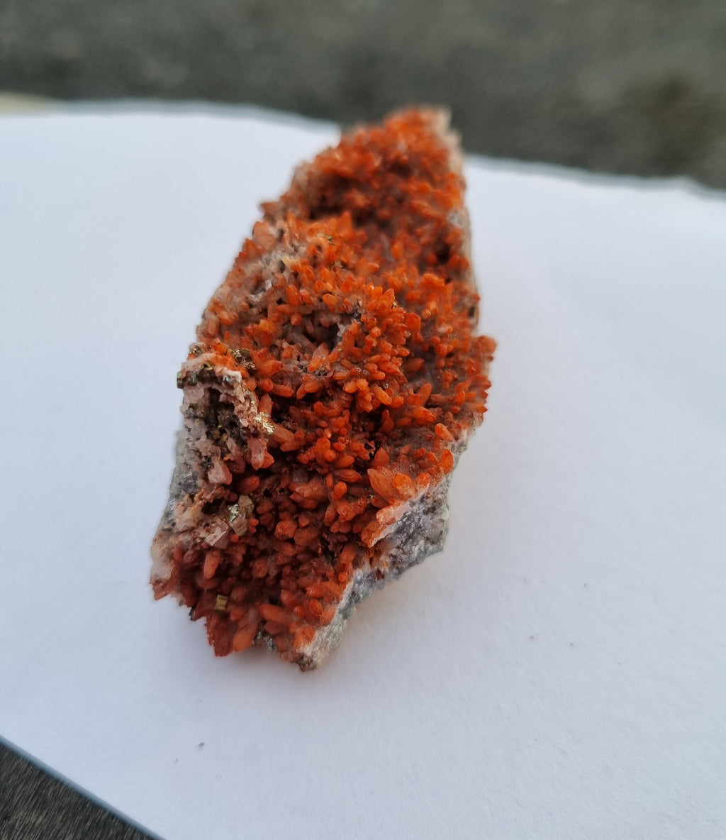 Quartz with red hematite and calicopyrite cluster